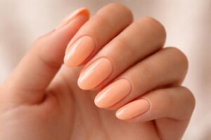 Chic and Subtle: The Allure of Pastel Orange Nails
